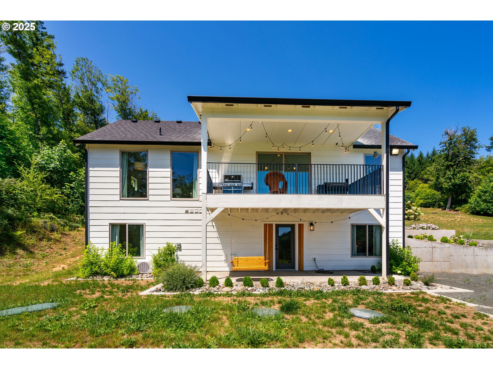 5601 Lewis River Road Ariel, WA 98603 - Photo 42 of 48 a view of house with yard