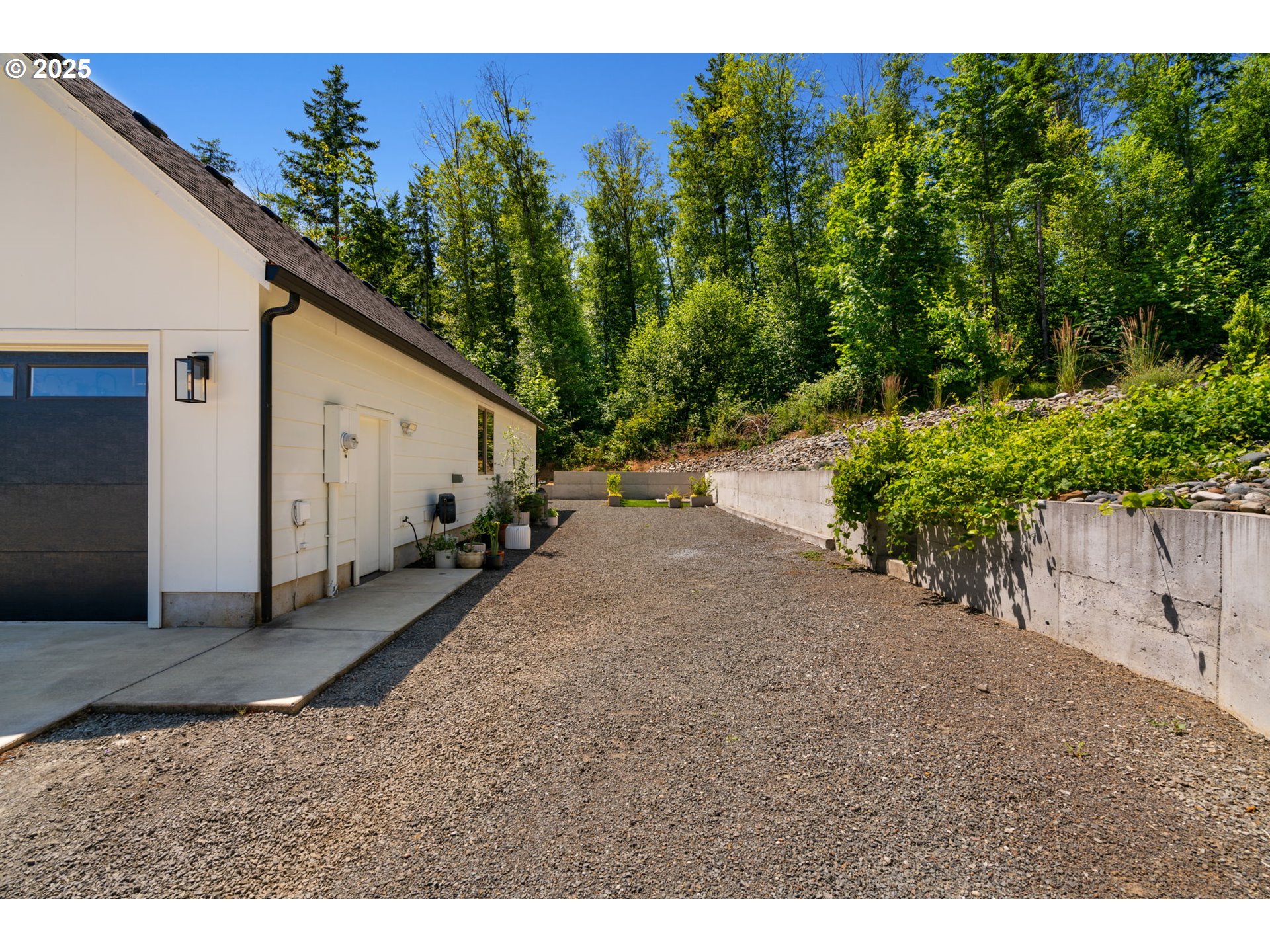 5601 Lewis River Road Ariel, WA 98603 - Photo 43 of 48 a backyard of a house with lots of green space