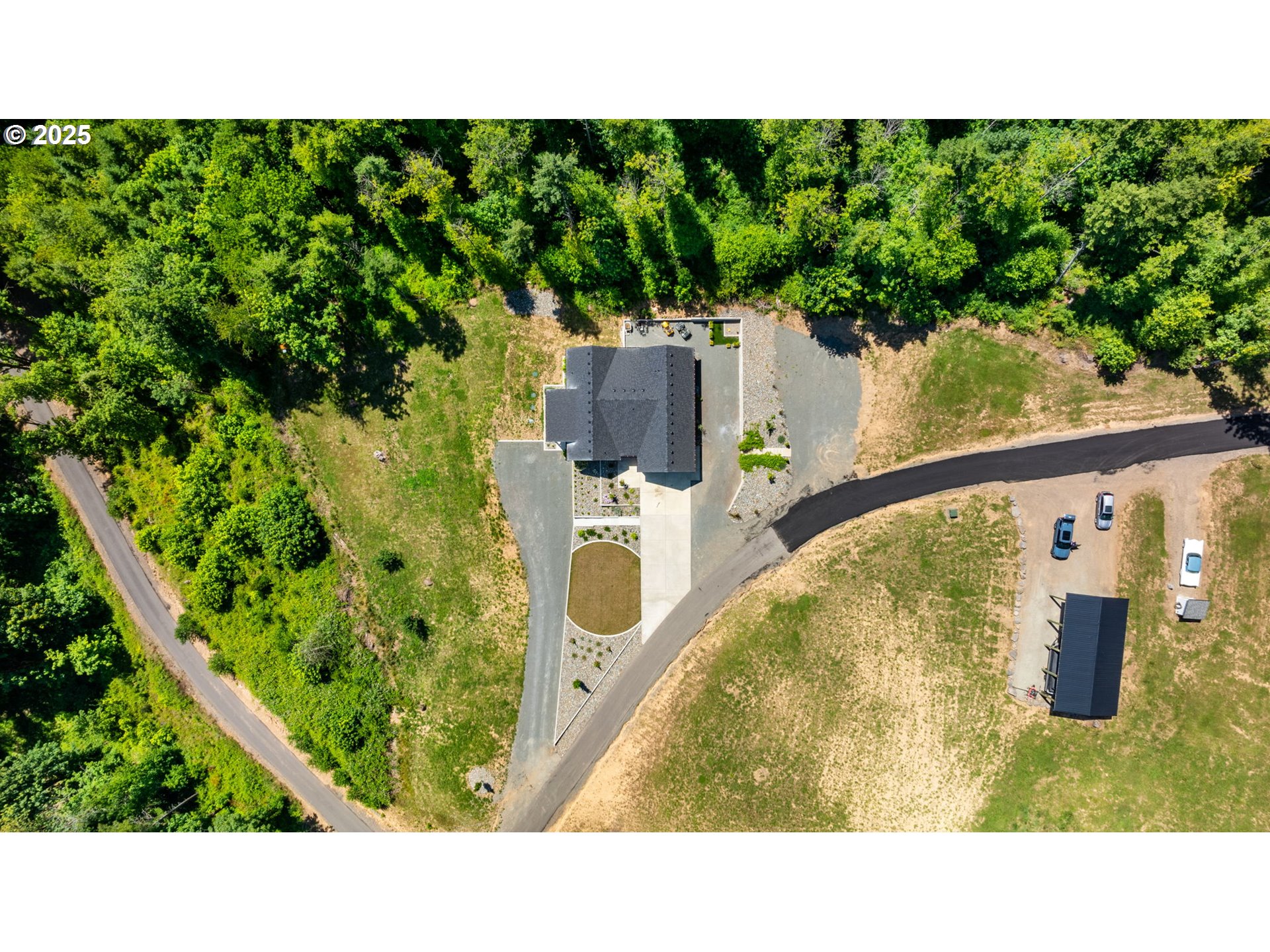 5601 Lewis River Road Ariel, WA 98603 - Photo 45 of 48 a black and white photo of a house
