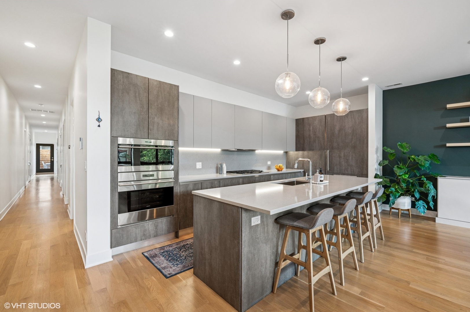 1156 West Ohio Street, Unit 2E Chicago, IL 60642 - Photo 12 of 30 a kitchen with a table and chairs in it