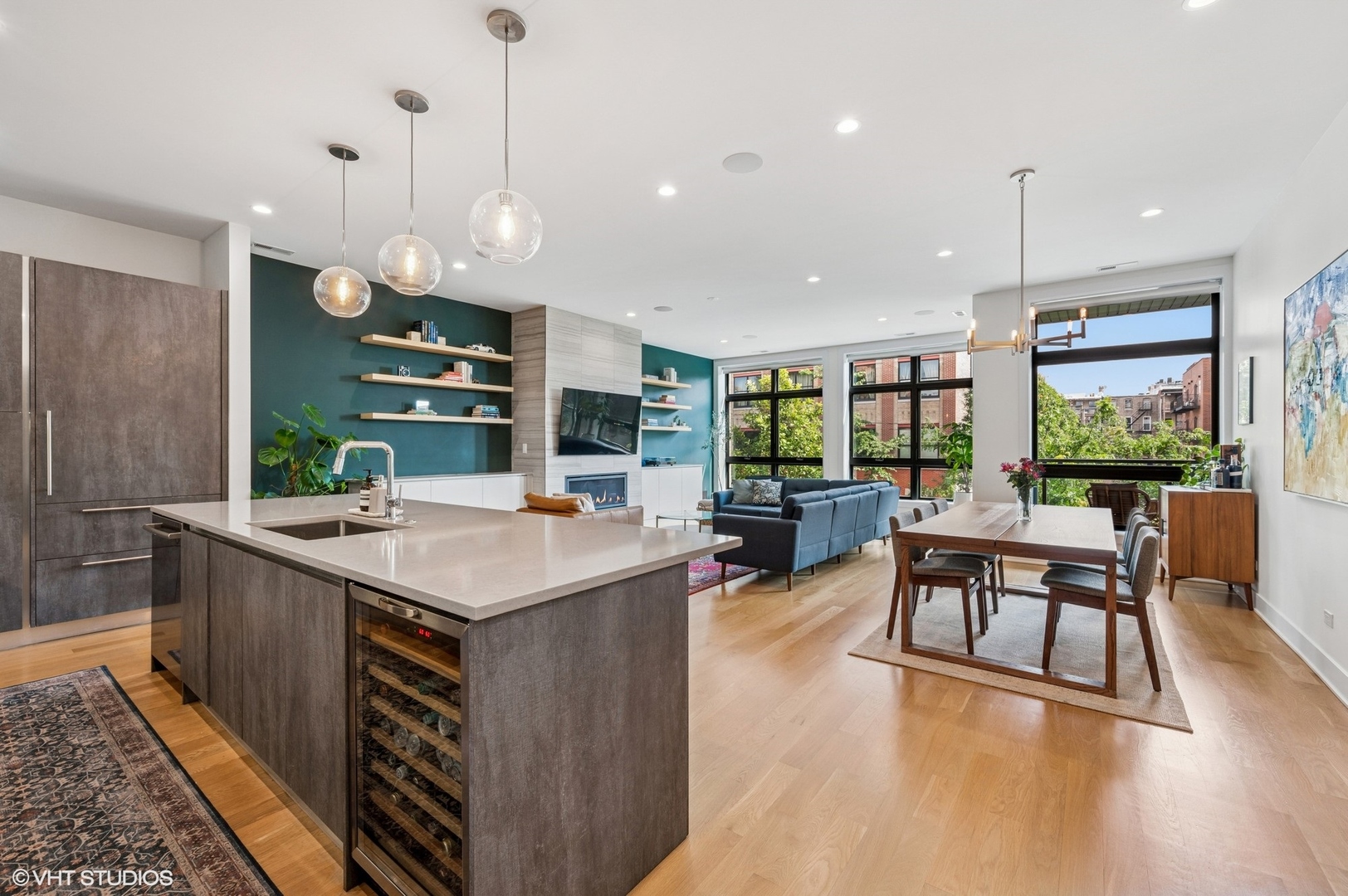 1156 West Ohio Street, Unit 2E Chicago, IL 60642 - Photo 13 of 30 a kitchen with stainless steel appliances granite countertop a stove and a wooden floors
