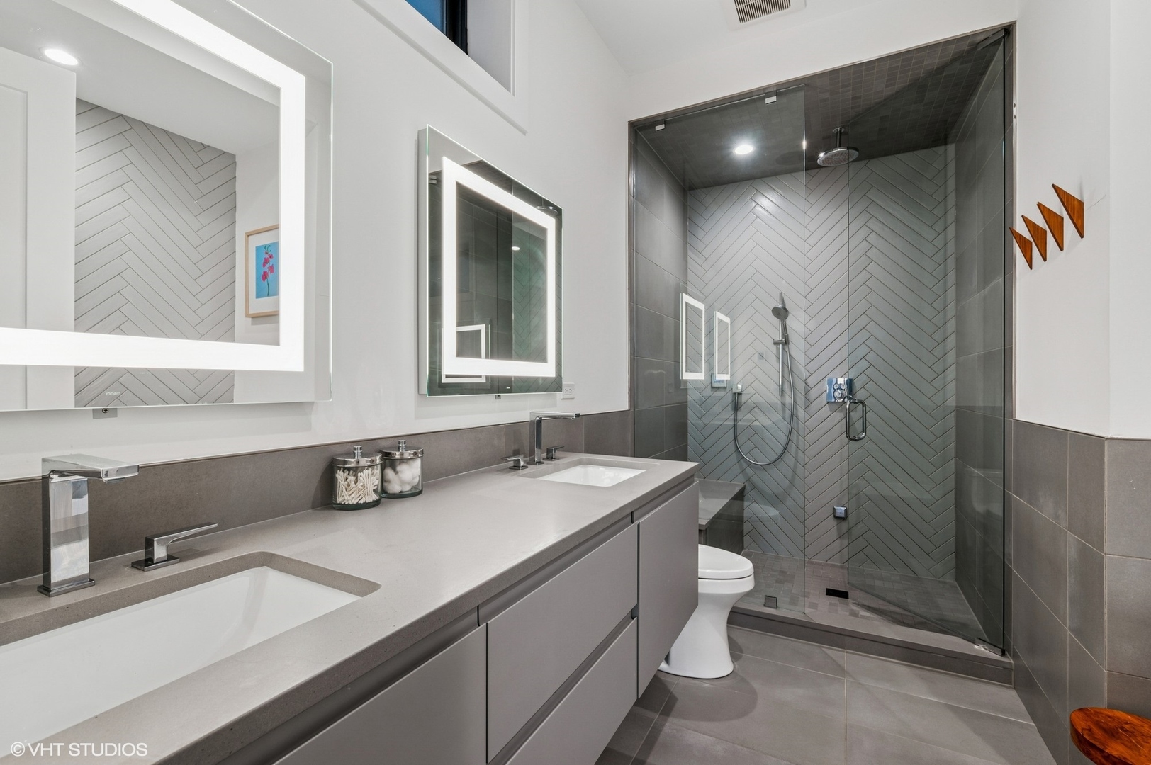 1156 West Ohio Street, Unit 2E Chicago, IL 60642 - Photo 18 of 30 a bathroom with a sink a toilet and shower