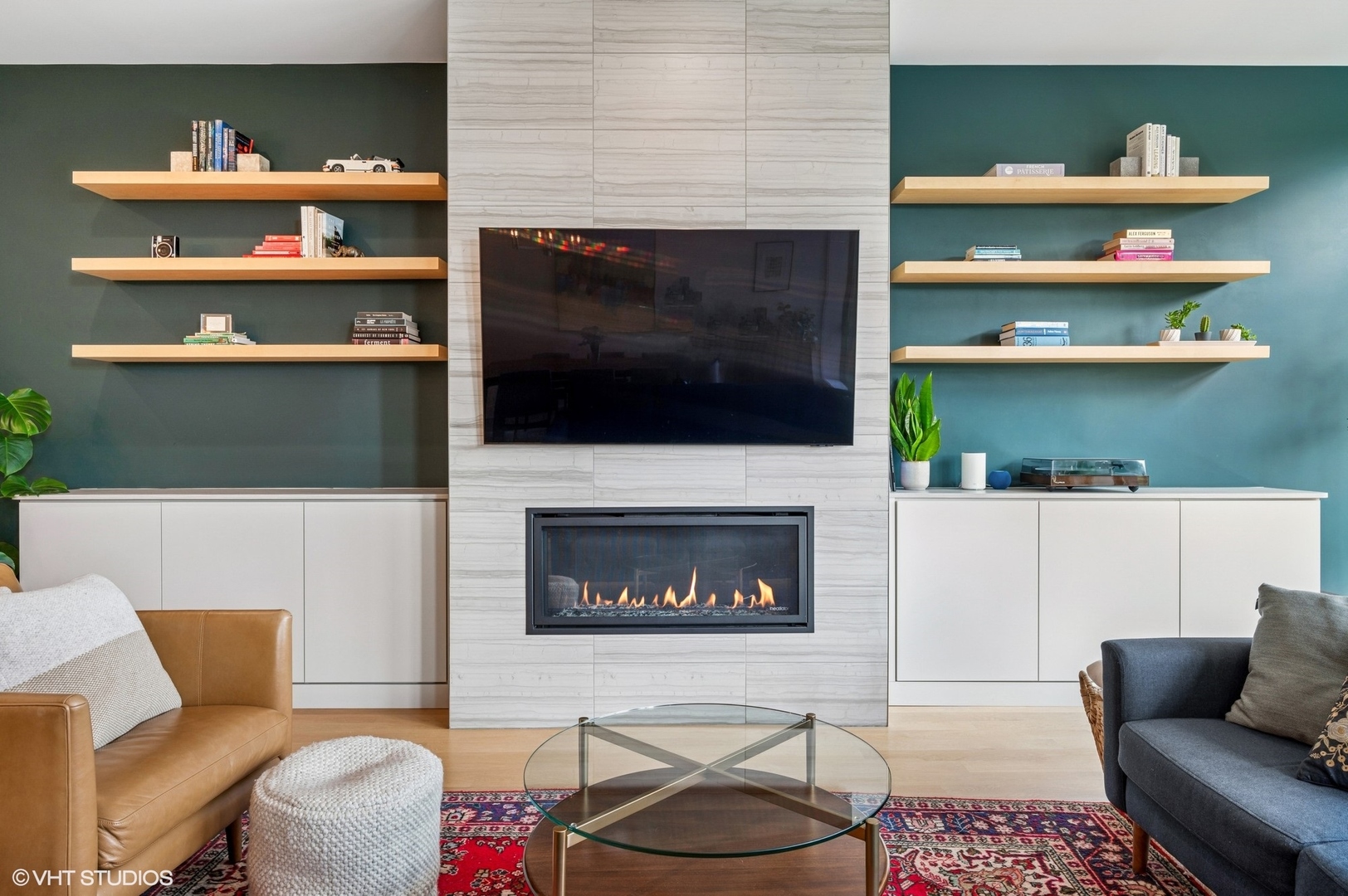 1156 West Ohio Street, Unit 2E Chicago, IL 60642 - Photo 5 of 30 a living room with a fireplace and a wooden floor
