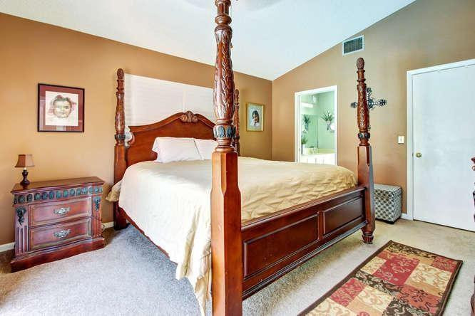 22682 Pickerel Circle Boca Raton, FL 33428 - Photo 15 of 20 a bed room with a bed and a dresser