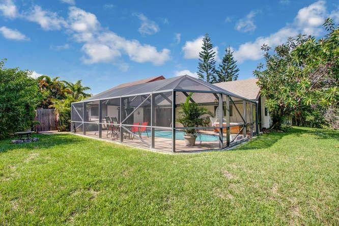 22682 Pickerel Circle Boca Raton, FL 33428 - Photo 5 of 20 a view of a house with backyard porch and sitting area