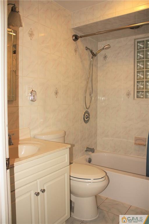 595 Old Post Road Edison, NJ 08817 - Photo 12 of 19 a bathroom with a shower a toilet and sink