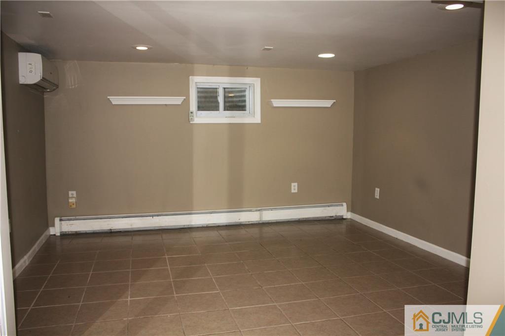 595 Old Post Road Edison, NJ 08817 - Photo 17 of 19 a view of an empty room with a window