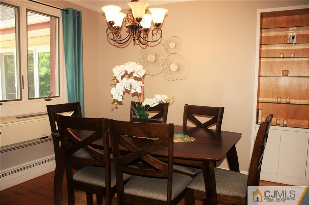 595 Old Post Road Edison, NJ 08817 - Photo 6 of 19 a dining room with furniture and window