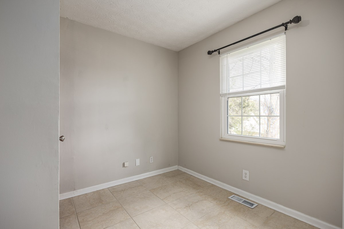 5916 Retriever Court Antioch, TN 37013 - Photo 12 of 30 an empty room with a window
