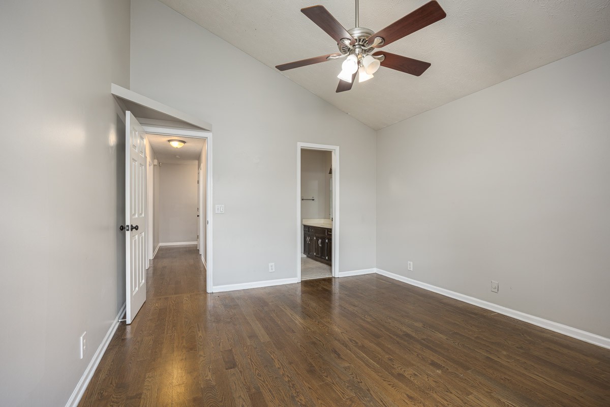 5916 Retriever Court Antioch, TN 37013 - Photo 17 of 30 a view of an empty room with wooden floor