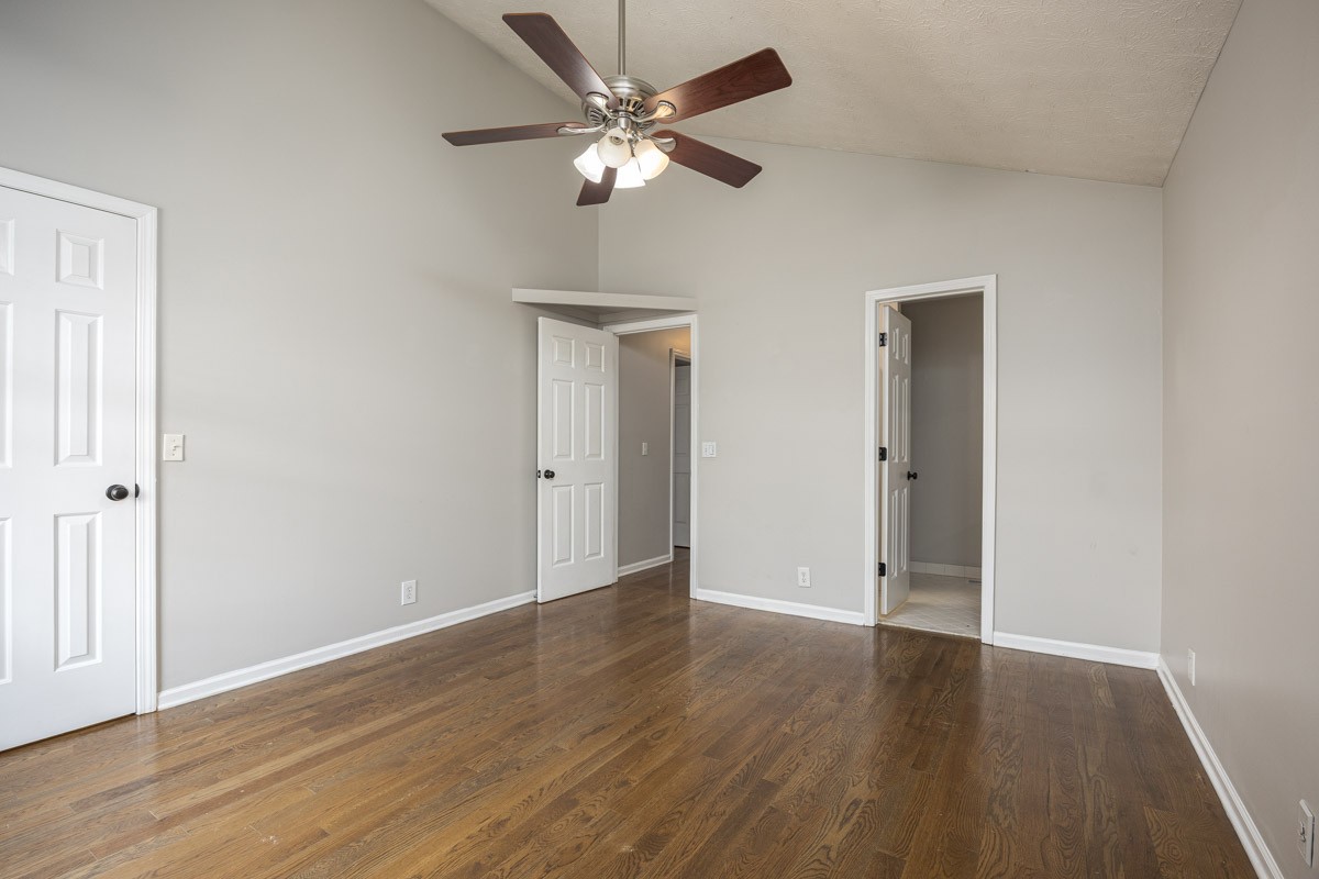 5916 Retriever Court Antioch, TN 37013 - Photo 18 of 30 a view of an empty room with wooden floor