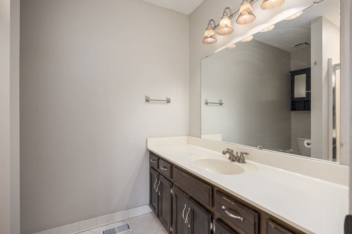 5916 Retriever Court Antioch, TN 37013 - Photo 19 of 30 a bathroom with a sink vanity and a mirror