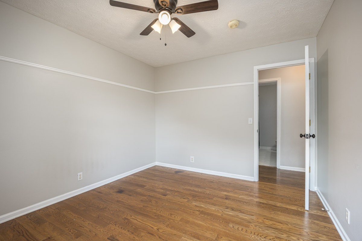 5916 Retriever Court Antioch, TN 37013 - Photo 24 of 30 wooden floor in an empty room