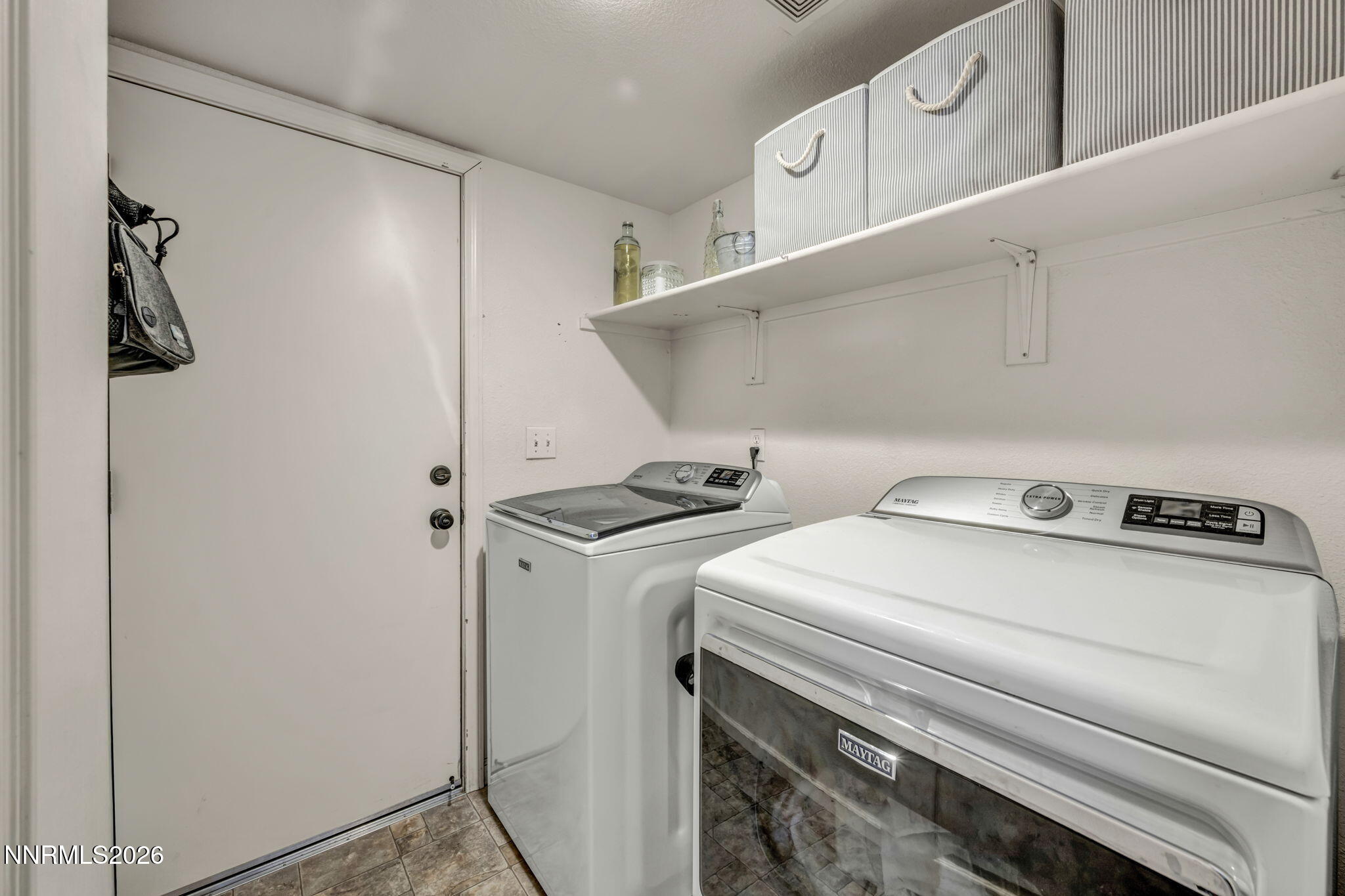 17615 Baileyville Court Reno, NV 89508 - Photo 7 of 19 a utility room with dryer and washer