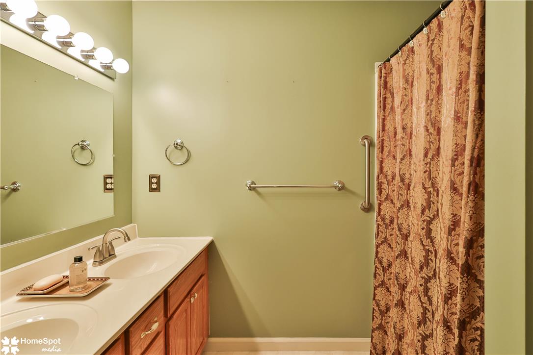 507 Howertown Road Northampton, PA 18067 - Photo 31 of 46 Functional bathroom featuring a double vanity with ample counter space and well-lit mirror.