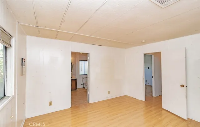a view of empty room with front door