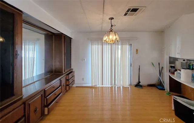 a kitchen with a stove oven and sink
