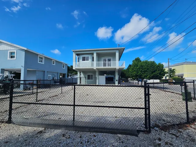 a front view of a house with a porch