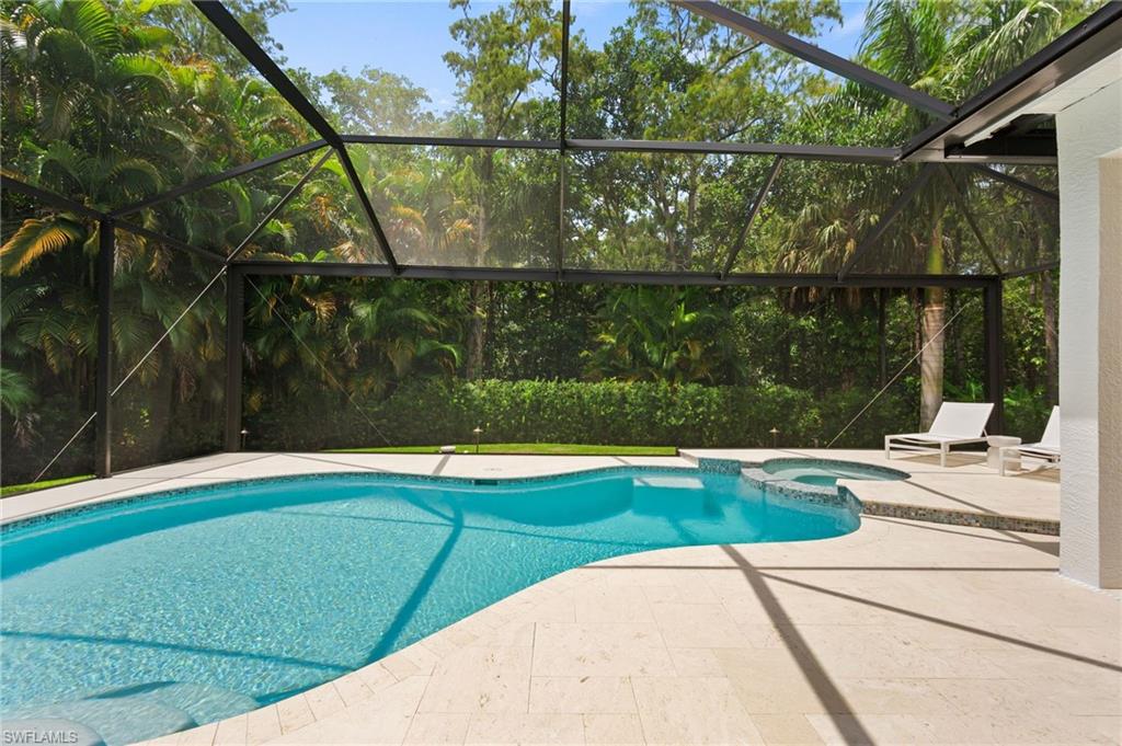 6689 Mill Run Road Naples, FL 34109 - Photo 25 of 37 a view of a balcony with yard