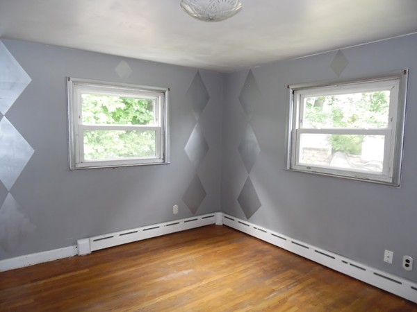 135 Columbia Road Lowell, MA 01854 - Photo 6 of 12 a room with a window