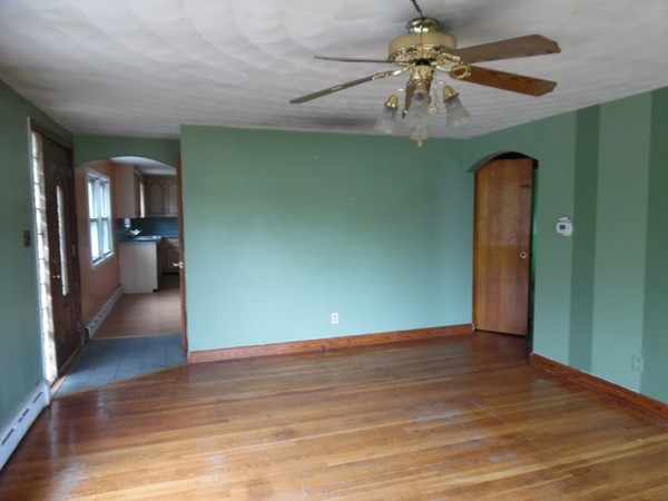135 Columbia Road Lowell, MA 01854 - Photo 10 of 12 a view of an empty room with a window