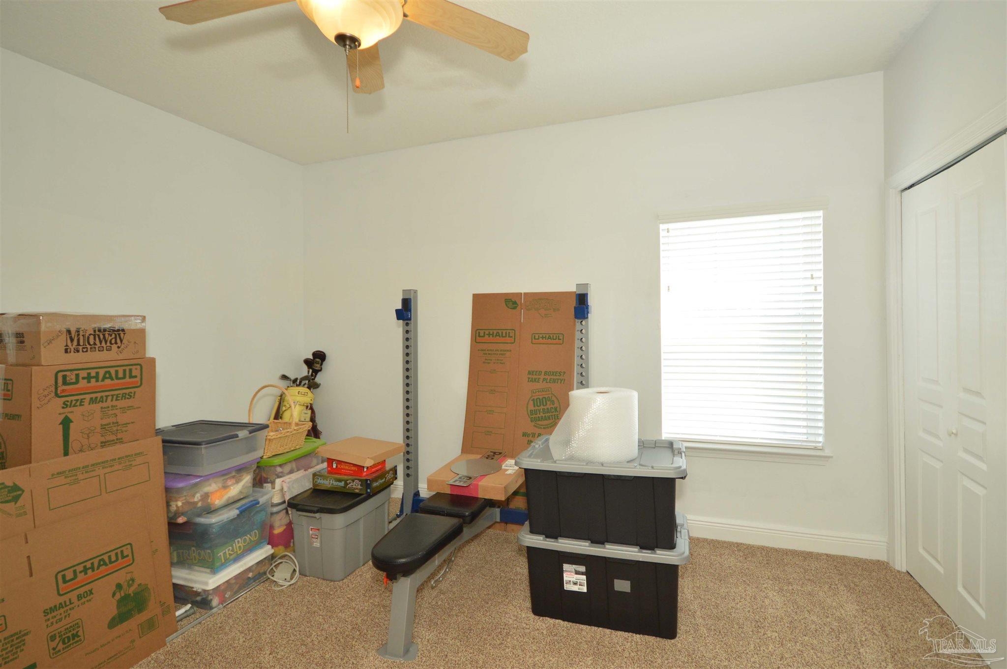 3478 Pine Level Church Road Jay, FL 32565 - Photo 40 of 50 a living room with furniture and a window