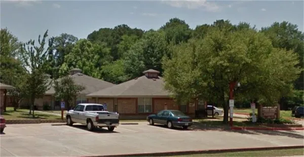 a car parked in front of a house