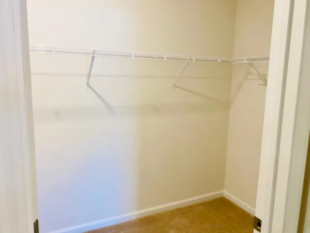 a view of a garage with wooden walls