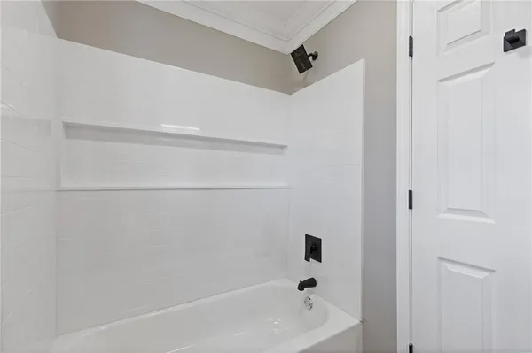 a bathroom with a bathtub