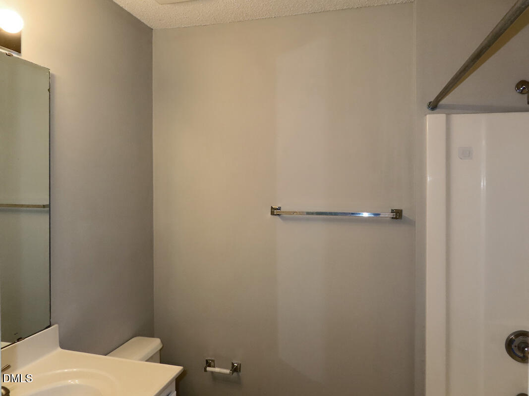 303 Smith Level Road, Unit B31 Chapel Hill, NC 27516 - Photo 13 of 20 a bathroom with a sink and toilet