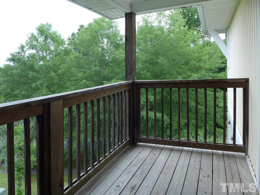 303 Smith Level Road, Unit B31 Chapel Hill, NC 27516 - Photo 19 of 20 a view of balcony with wooden floor