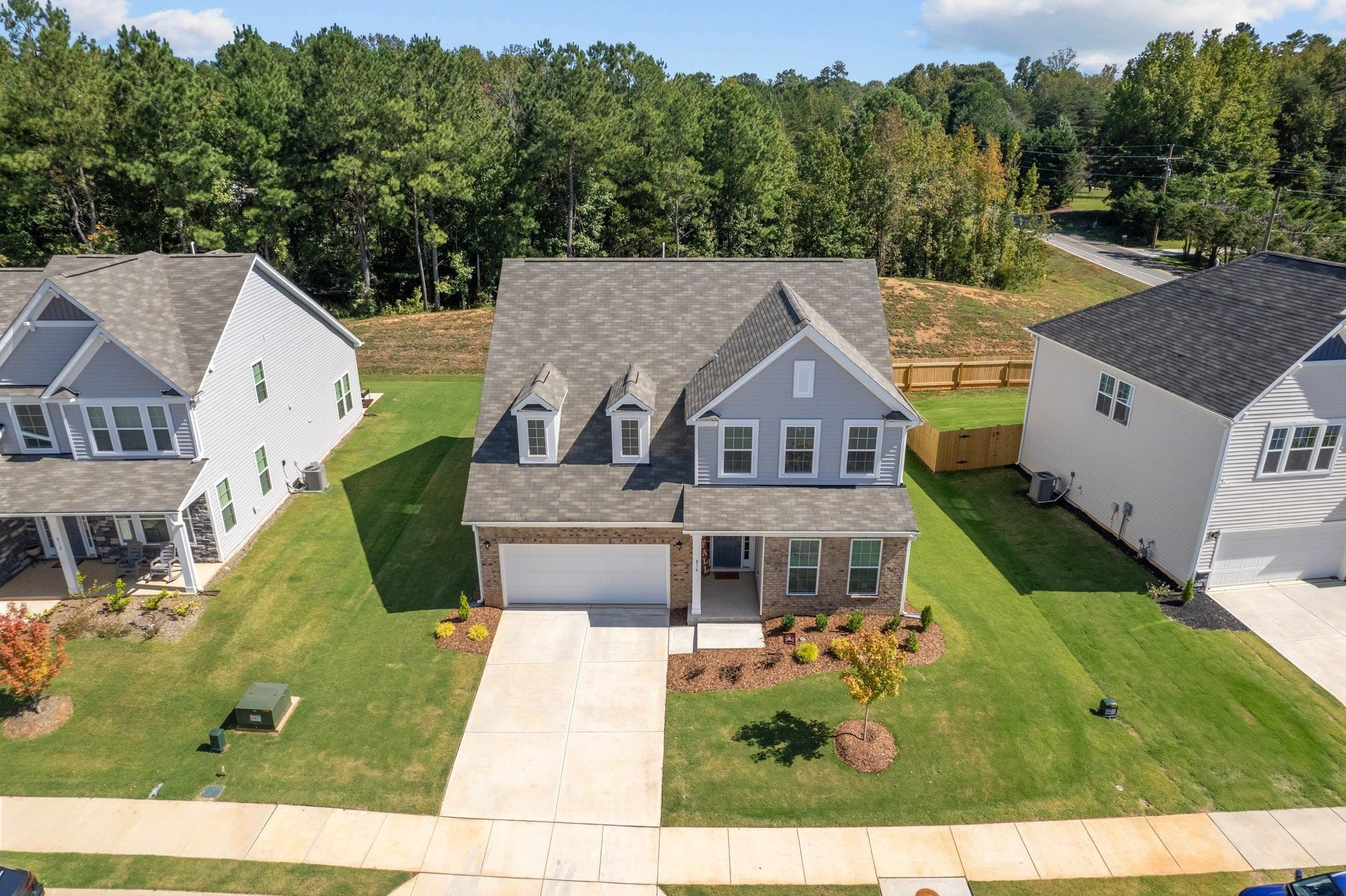 816 Heartpine Drive Mebane, NC 27302 - Photo 2 of 56 a aerial view of a house with a yard