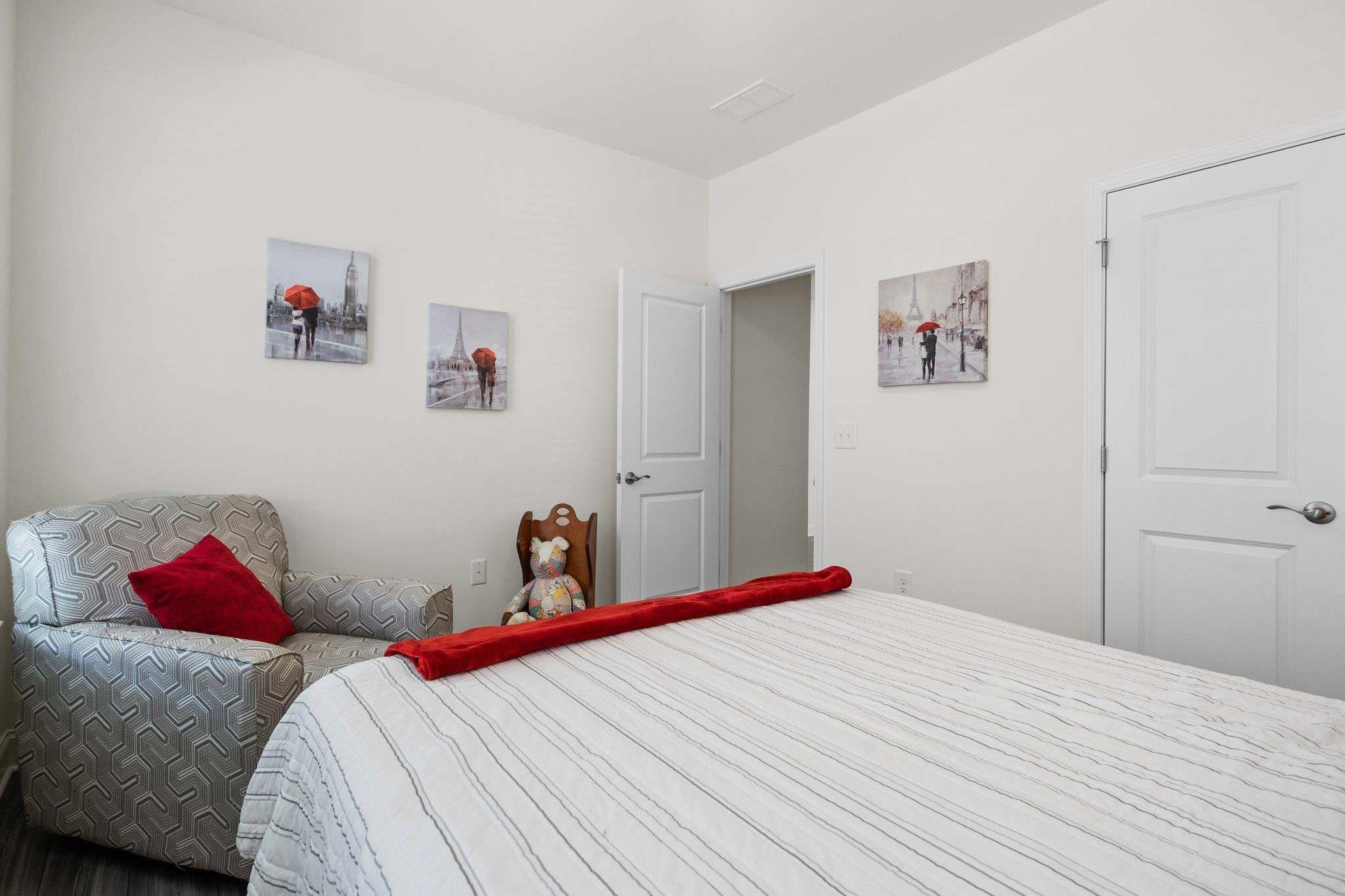 816 Heartpine Drive Mebane, NC 27302 - Photo 23 of 56 a bedroom with a bed and the wall painting
