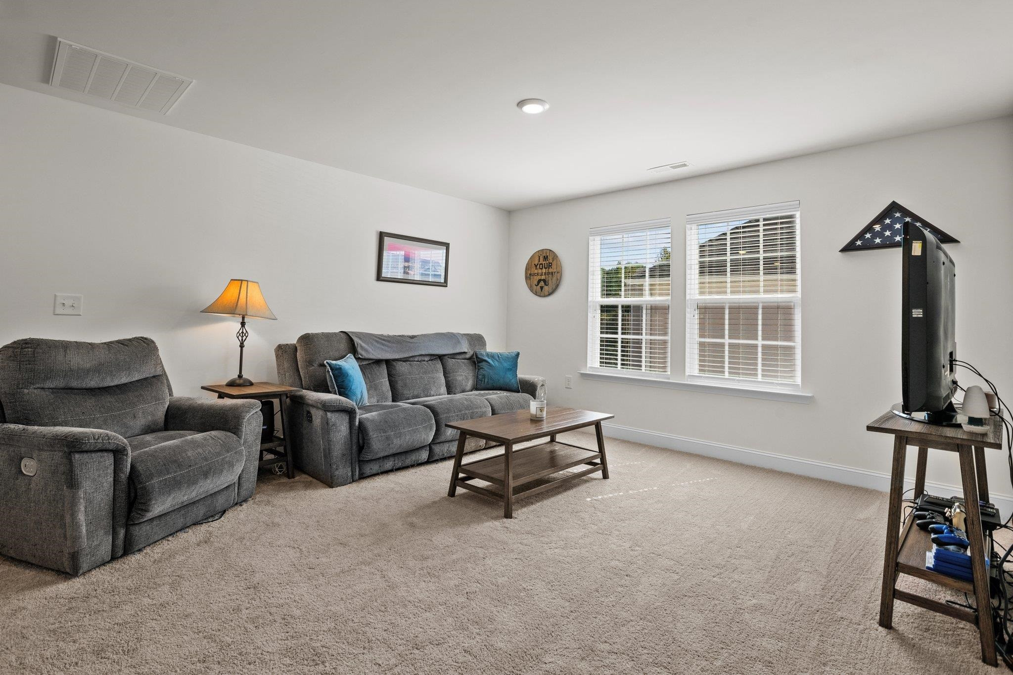 816 Heartpine Drive Mebane, NC 27302 - Photo 27 of 56 a living room with furniture and a window