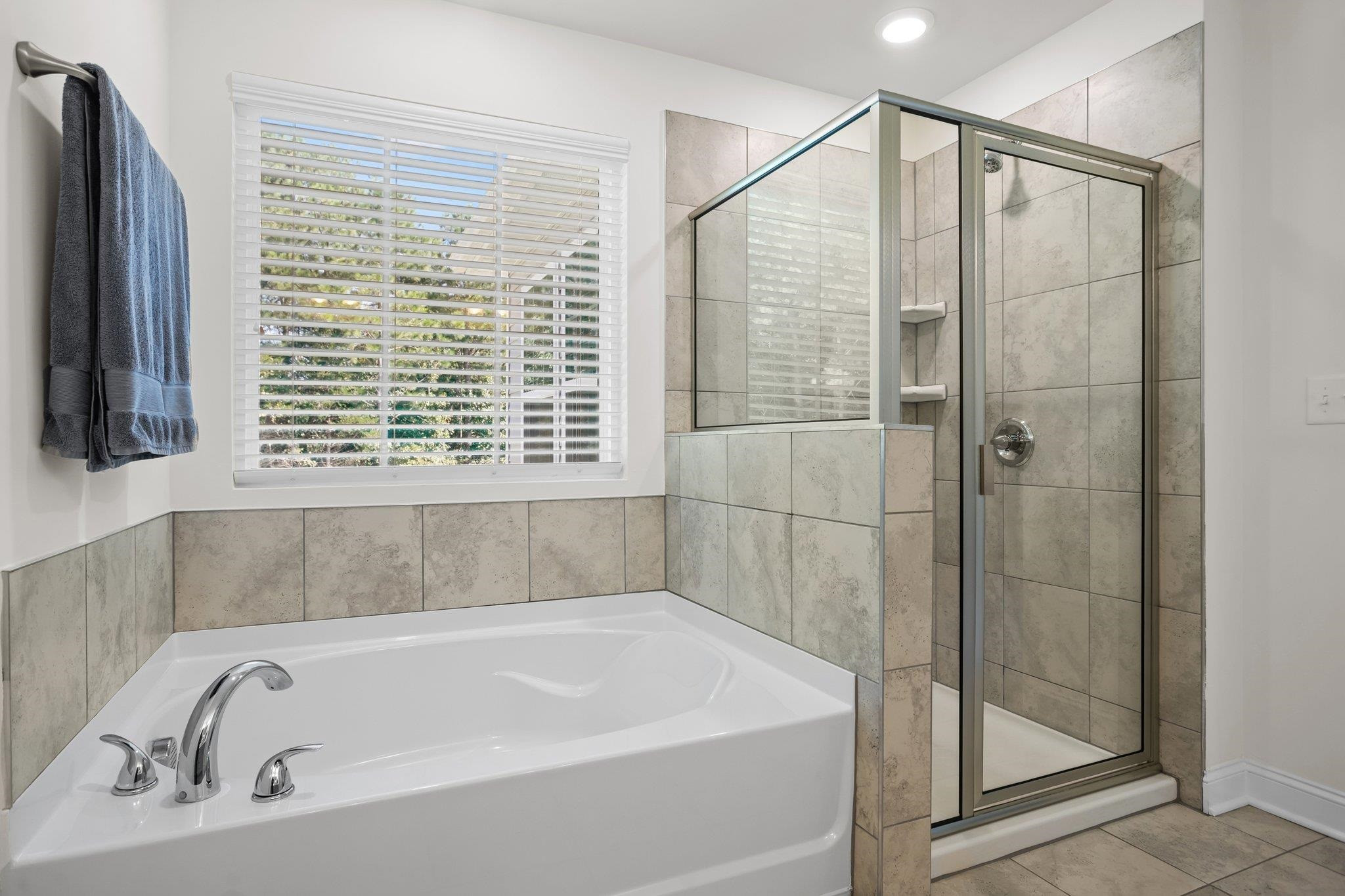 816 Heartpine Drive Mebane, NC 27302 - Photo 33 of 56 a bathroom with a bathtub and a shower