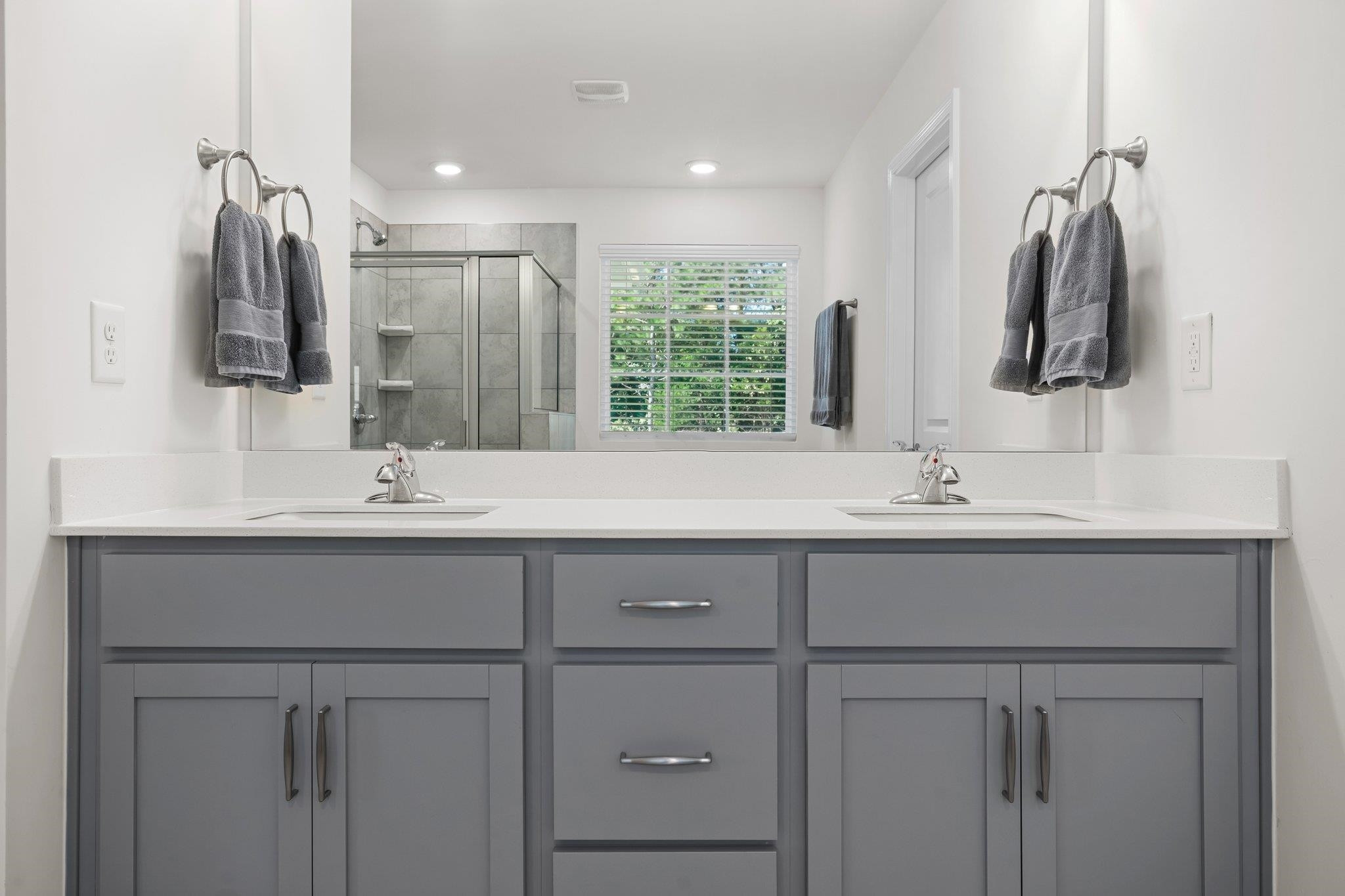 816 Heartpine Drive Mebane, NC 27302 - Photo 34 of 56 a bathroom with a sink and a mirror