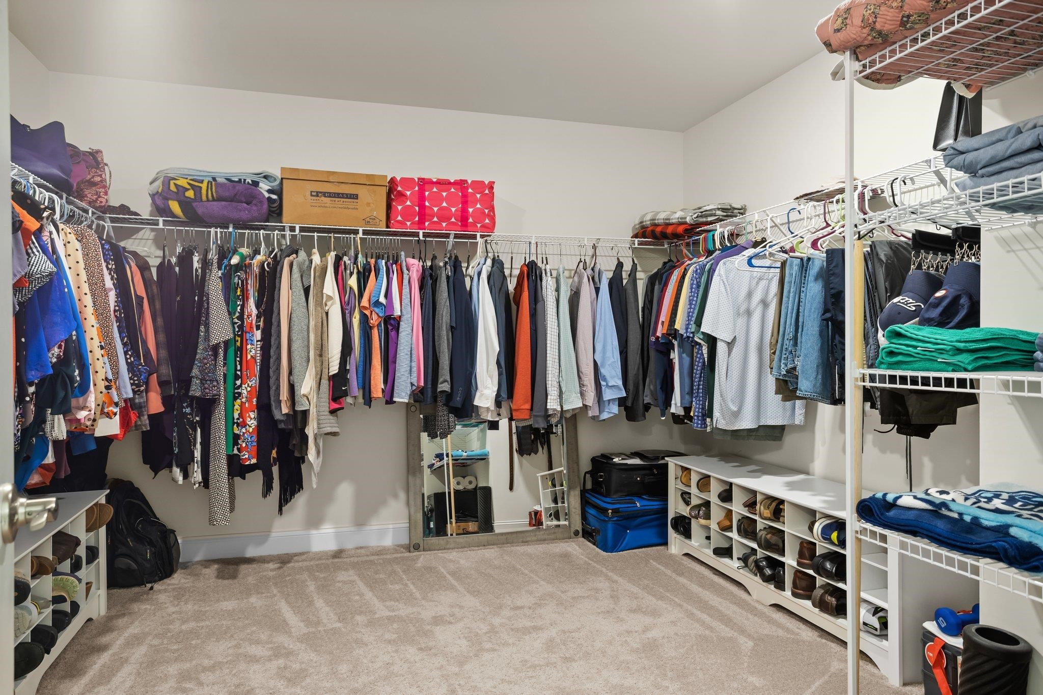 816 Heartpine Drive Mebane, NC 27302 - Photo 36 of 56 a view of walk in closet with clothes