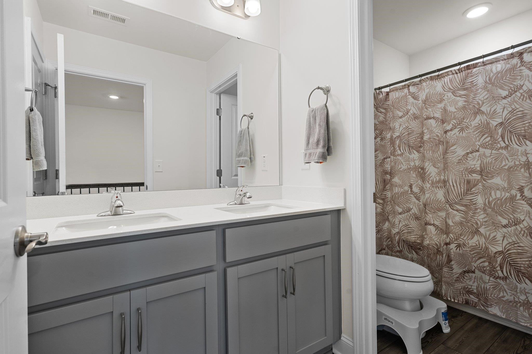 816 Heartpine Drive Mebane, NC 27302 - Photo 38 of 56 a bathroom with a sink and a mirror