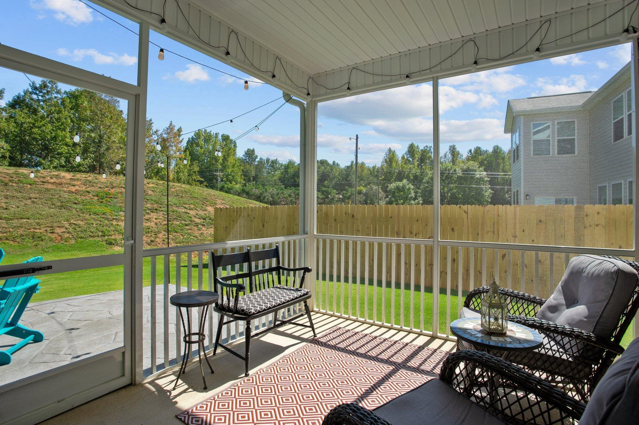 816 Heartpine Drive Mebane, NC 27302 - Photo 43 of 56 a view of a chair and tables in the balcony