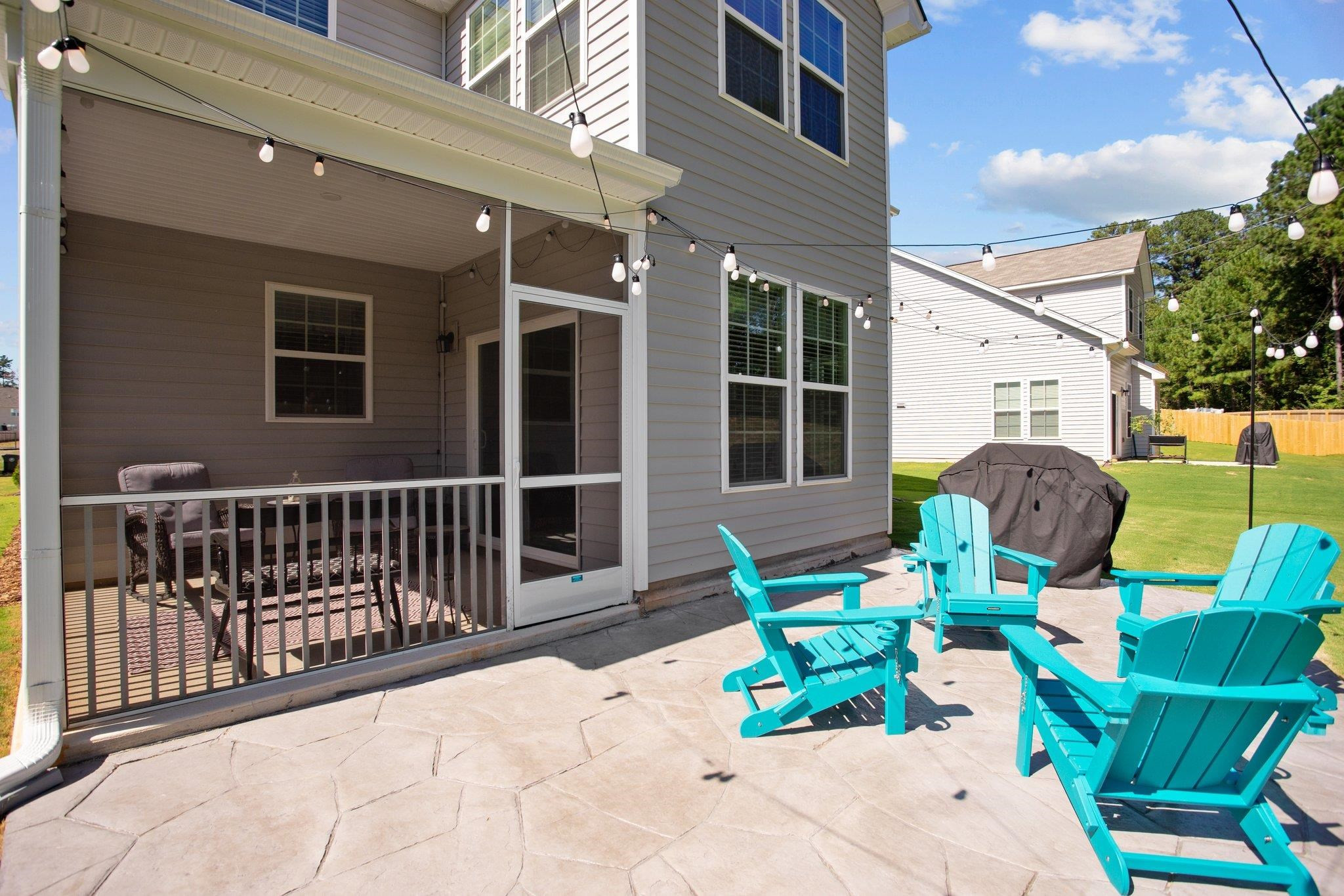816 Heartpine Drive Mebane, NC 27302 - Photo 45 of 56 a front view of a house with patio and garden