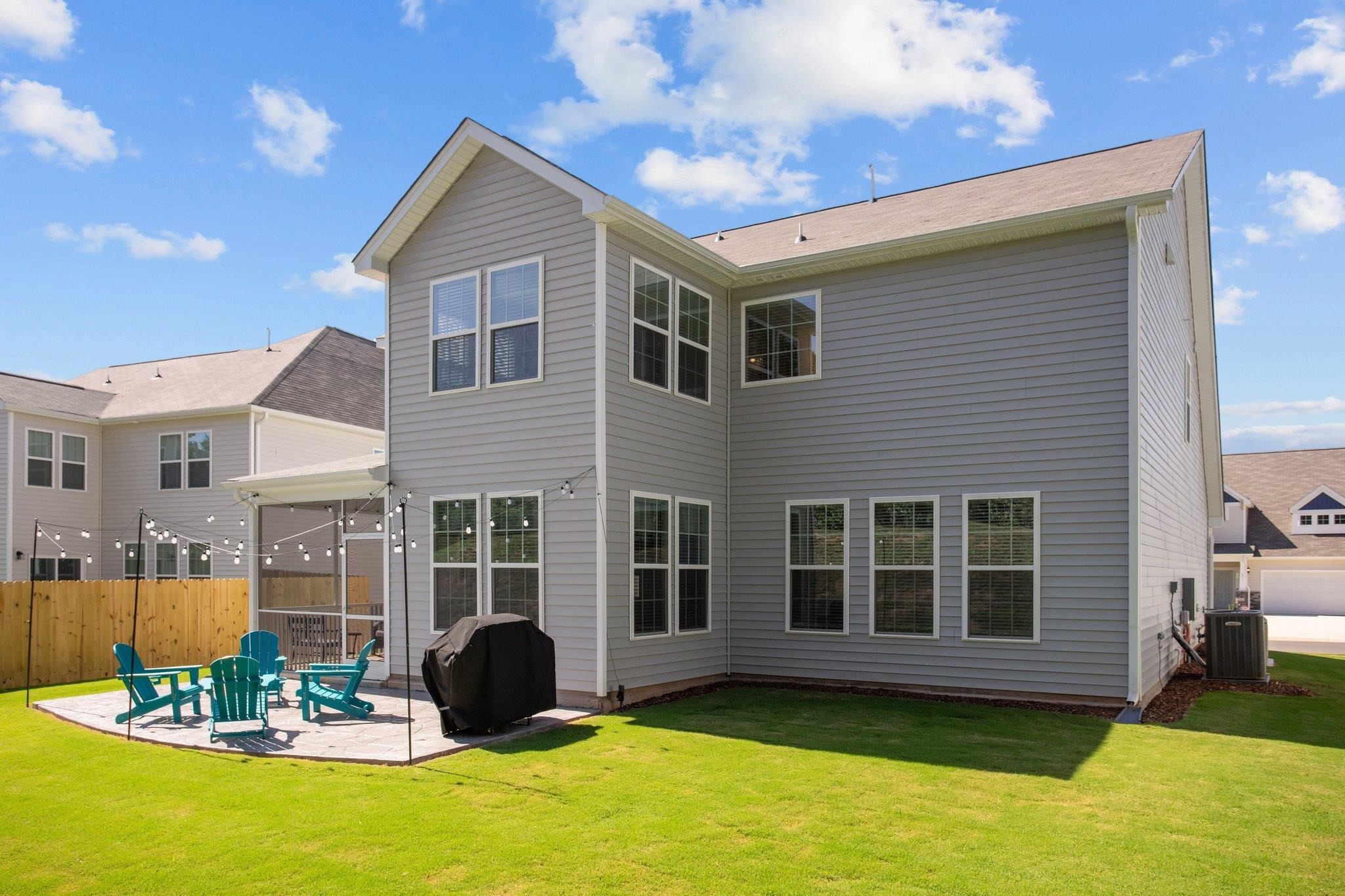 816 Heartpine Drive Mebane, NC 27302 - Photo 46 of 56 a front view of a house with a garden