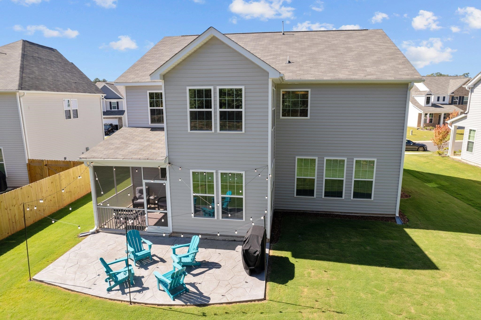 816 Heartpine Drive Mebane, NC 27302 - Photo 49 of 56 a view of a house with backyard porch and sitting area
