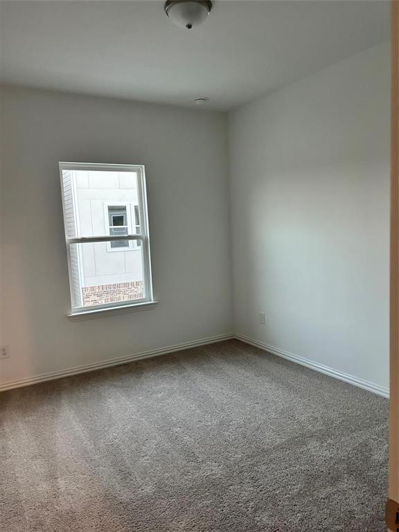 4704 Craymore Road Dallas, TX 75228 - Photo 8 of 14 an empty room with a window