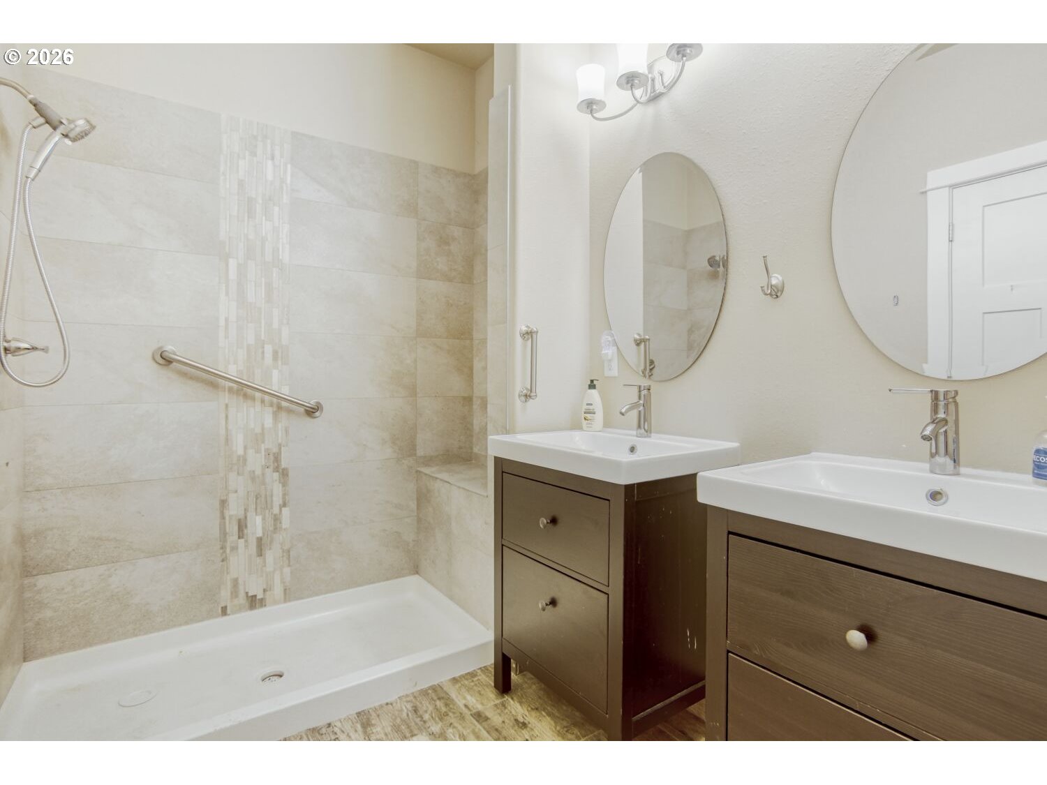 20845 Southwest Eggert Way Beaverton, OR 97078 - Photo 14 of 28 a bathroom with a double vanity sink mirror and shower