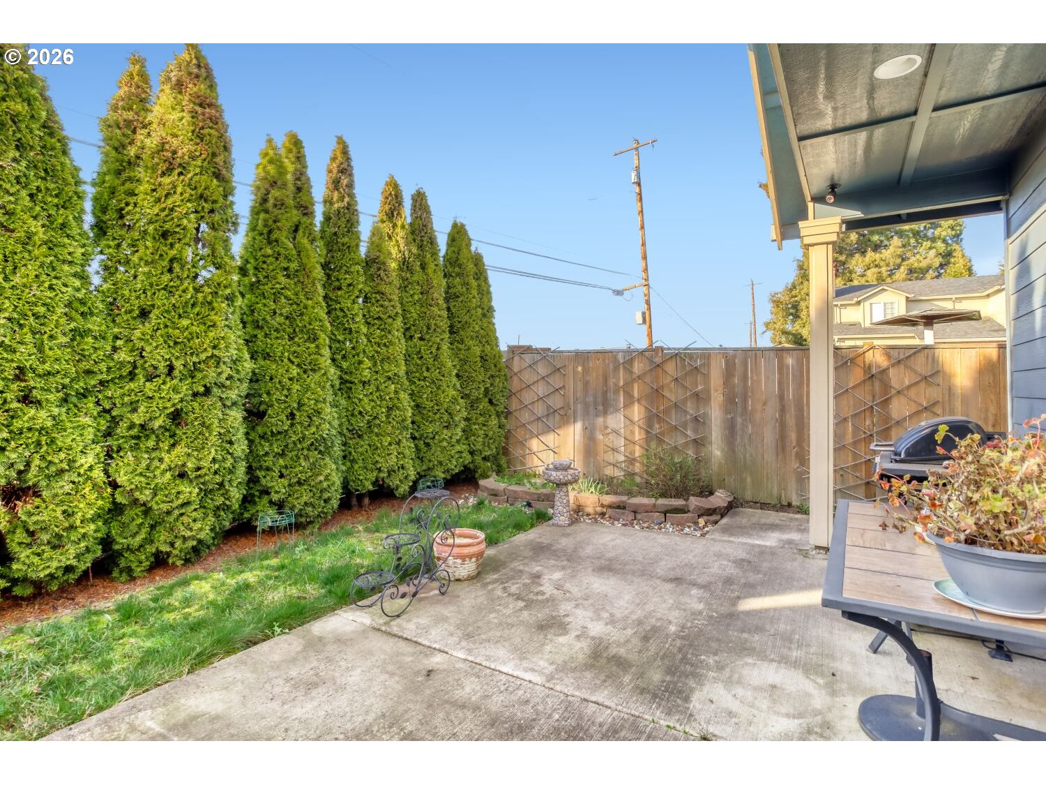 20845 Southwest Eggert Way Beaverton, OR 97078 - Photo 27 of 28 a view of a backyard with plants and a garden