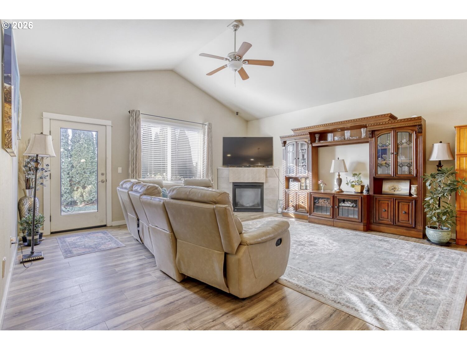 20845 Southwest Eggert Way Beaverton, OR 97078 - Photo 5 of 28 a living room with furniture and a flat screen tv