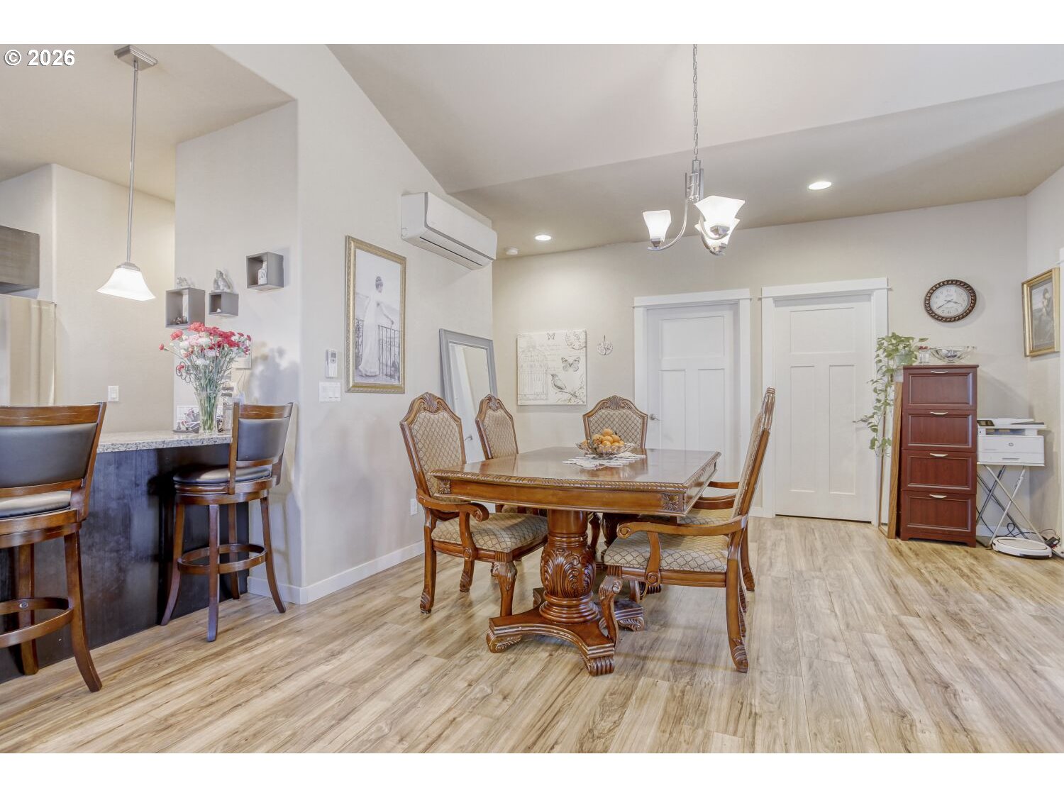 20845 Southwest Eggert Way Beaverton, OR 97078 - Photo 6 of 28 a view of a dining room with furniture and wooden floor