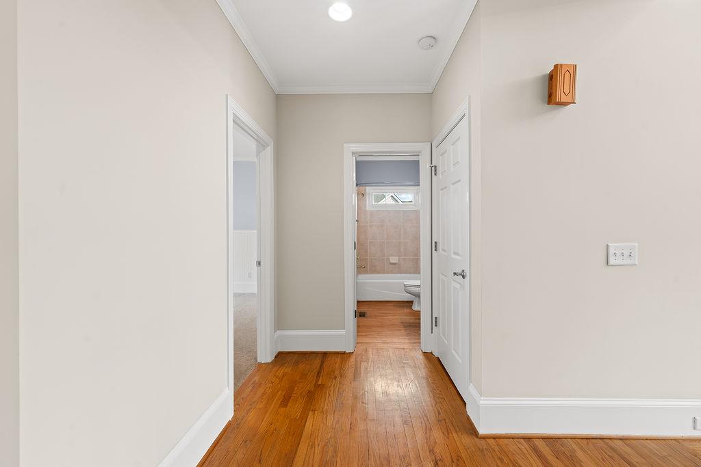 1037 Windermere Crossing Cumming, GA 30041 - Photo 29 of 95 a view of a room with wooden floor