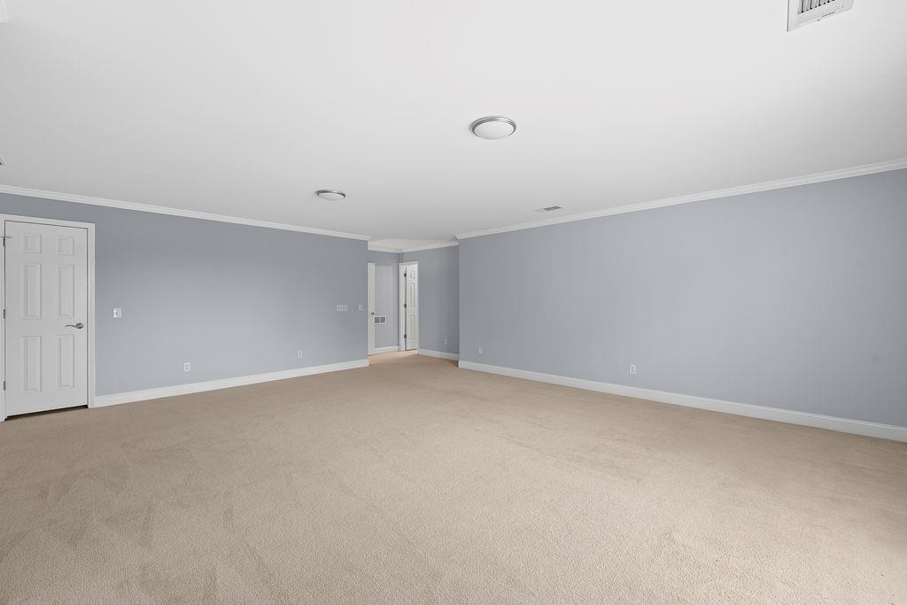 1037 Windermere Crossing Cumming, GA 30041 - Photo 61 of 95 a view of an empty room