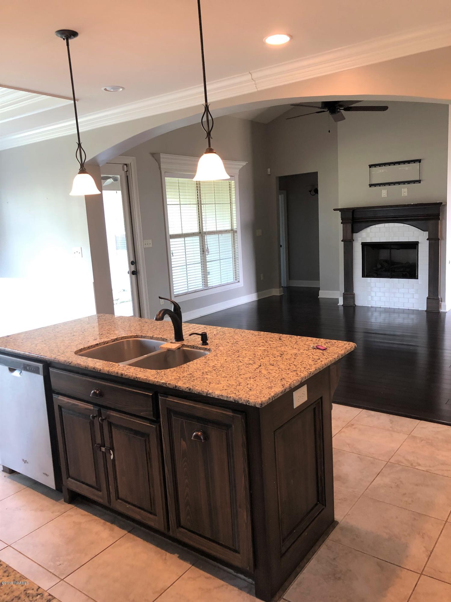 145 Camus Road Lafayette, LA 70503 - Photo 6 of 20 KITCHEN/ LIVING ROOM